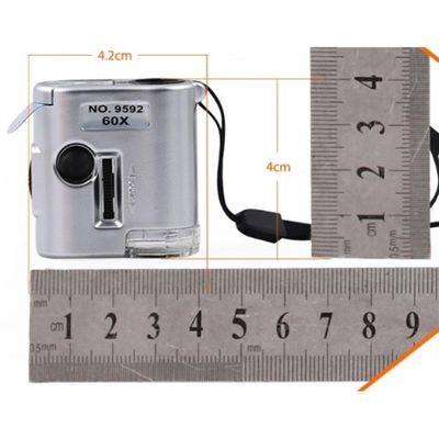 Mini Microscópio De Bolso 60x Com Led E Luz Ultravioleta Portátil E Versátil