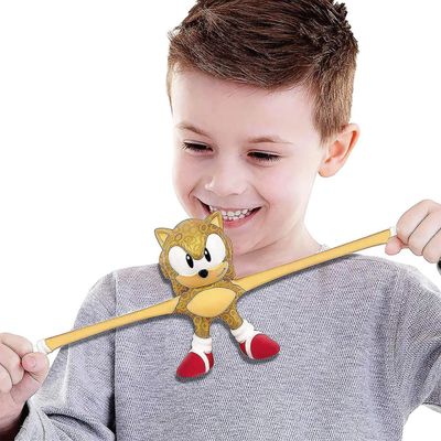 Boneco Super Sonic Heróis Goo Jit Zu Estica Dourado - Sunny
