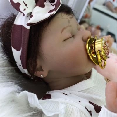 Bebê Reborn Menina Olhos Fechados Cabelo Implantado Fio A Fio Realista