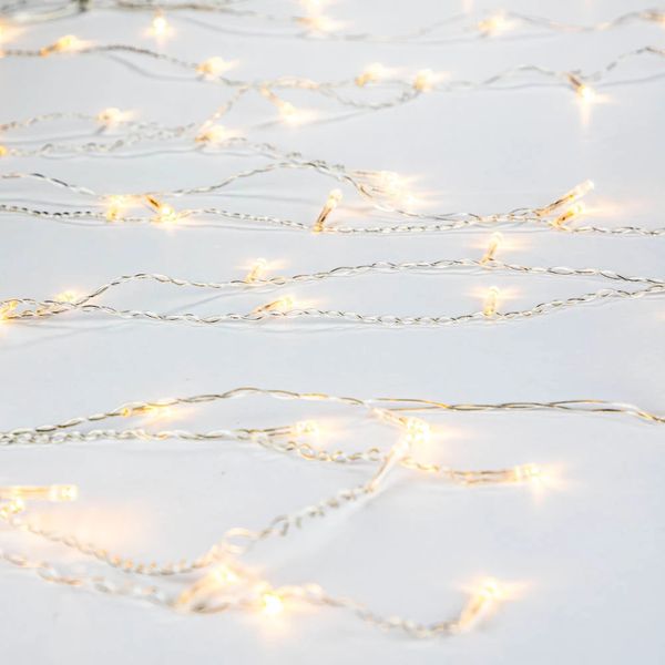 Cascata 100Led Não Pisca Fio de PVC com Strobo 220V 70x2,75m Branco Quente